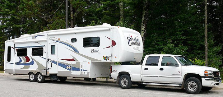 Truck Towing Trailer With Gooseneck Style Attachment